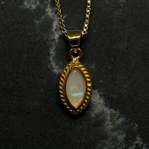 Australian Coober Pedy Marquise Cut Opal Set In 18k Gold